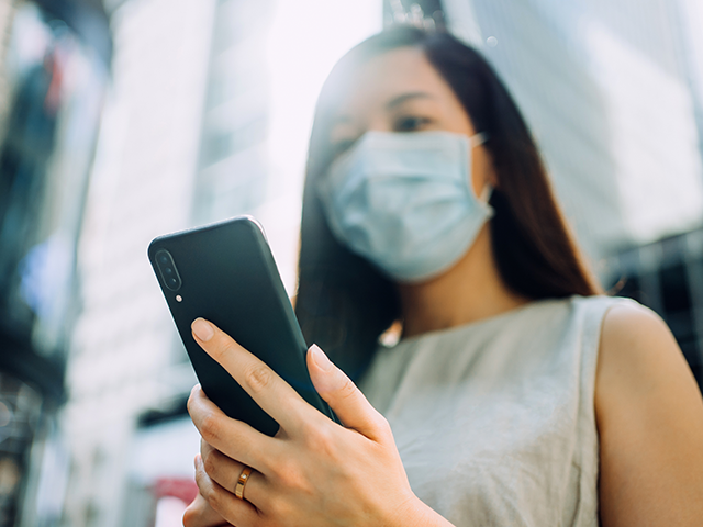Asian woman with phone