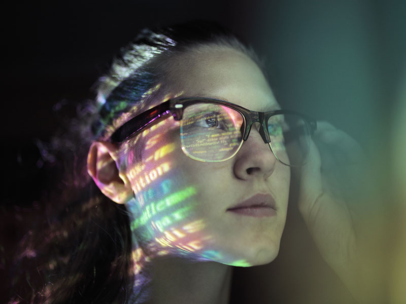 Portrait, girl lighted with colorful code