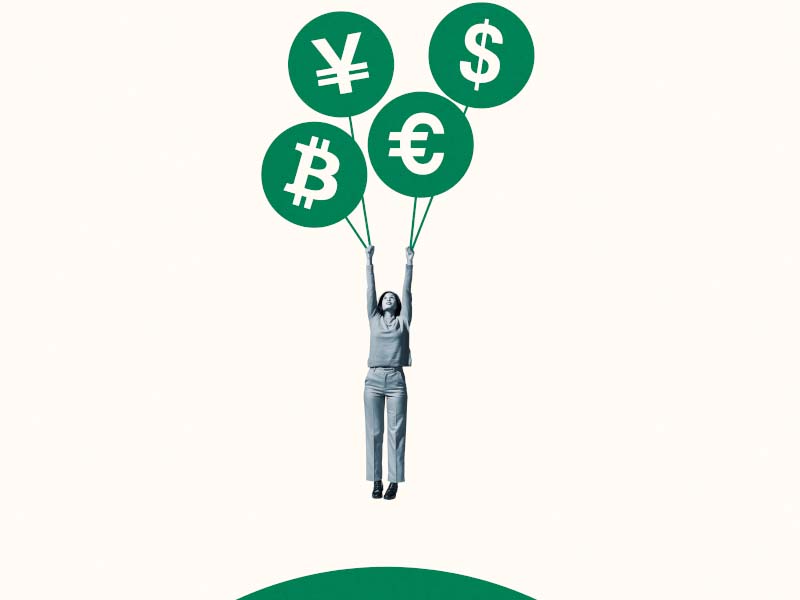 Woman hanging from green currency symbol balloons