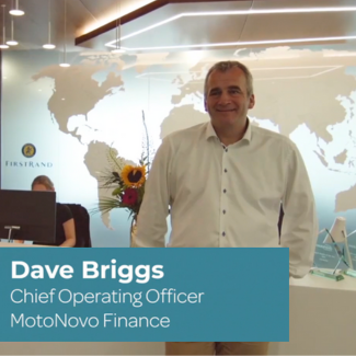 MotoNovo COO Dave Briggs stands in the MotoNovo office discussing digital identity verification and eSignature