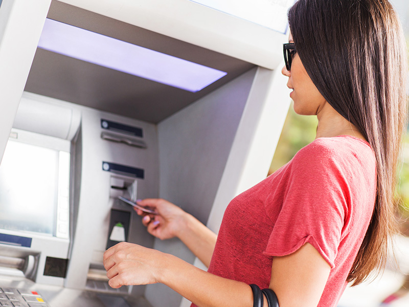 woman using ATM