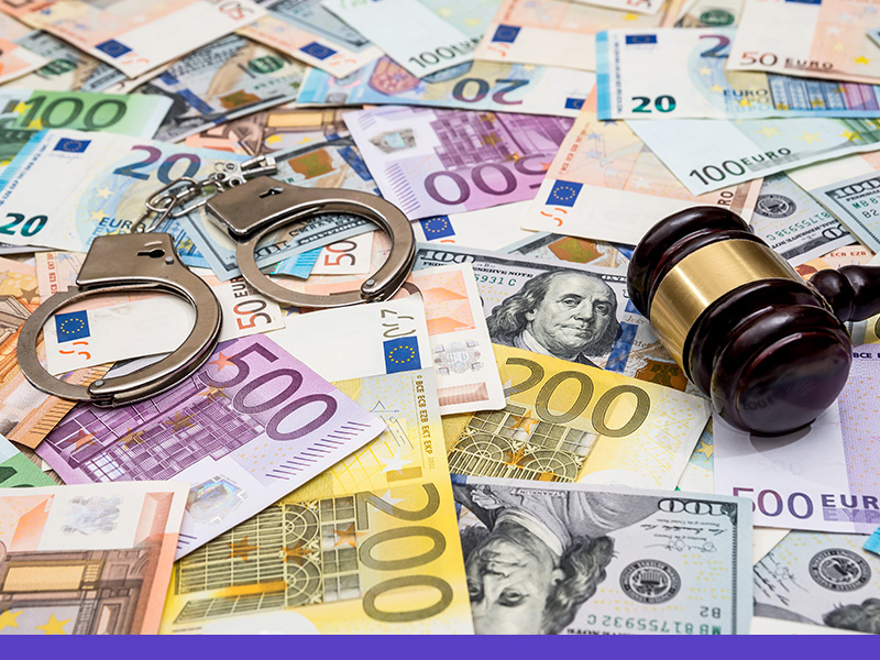 Euro currency with handcuffs