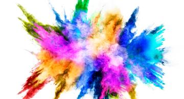 Explosion by an impact of a cloud of particles of powder of multicolored on a white background