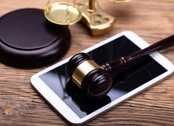 Judge Gavel With Smart Phone Near Justice Scale